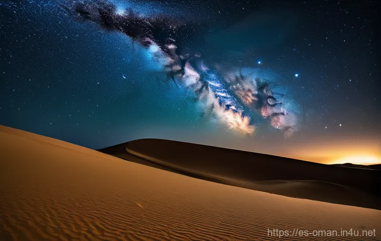 오만 사막의 별 관찰 - "A lone figure, fully and modestly clothed in warm, layered desert attire, sits on a comfortable mat...